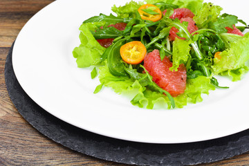 Juicy Fresh Green Salad of Lettuce, Arugula, Gapefruit and Kumqu