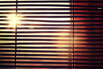 sun shining through the blinds