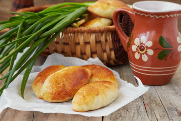 Fresh baked pasties filled with egg and green onion