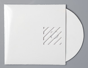 blank white compact disk with cover isolated on grey
