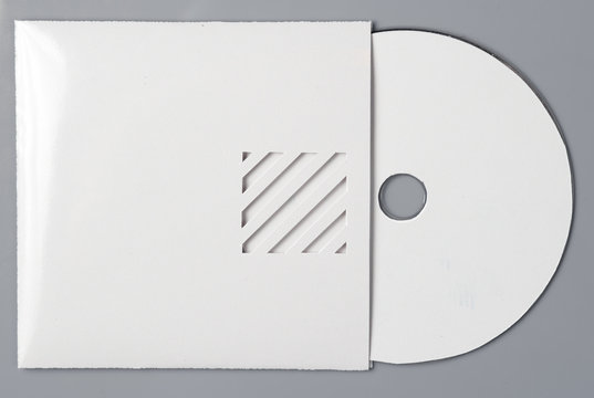 blank white compact disk with cover isolated on grey