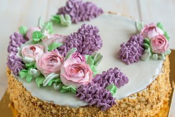 Fototapeta na wymiar Wedding cake with spring flowers.
