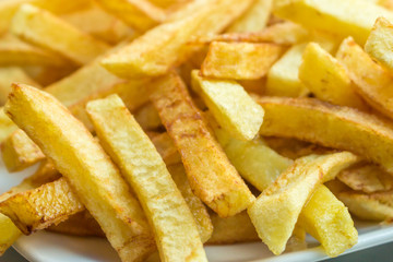 Hot fresh French fries in the plate
