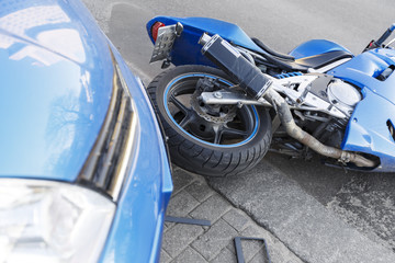 Accident motorcycle and cars on  road