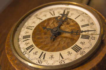 Fototapeta na wymiar Old wall clock with roman numerals