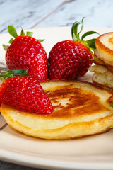 Freshly baked pancakes with strawberry