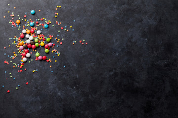 Colorful candies over stone