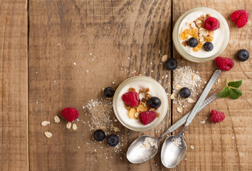 Yogurt with granola or muesli and fresh berries