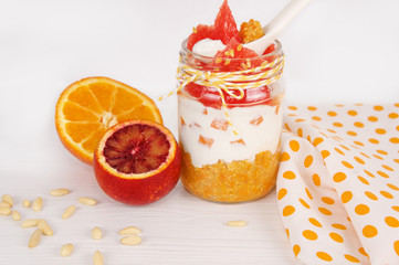 healthy breakfast in a jar. Quinoa, cream cheese, fruits. The co