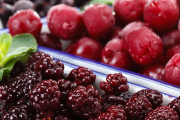 Frozen berries covered with ice