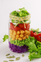 Salad in a jar. Healthy Homemade Mason Jar Salad. The concept of