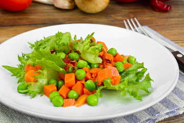 Juicy Vegetable Stew. Lettuce,  Peas and Carrots. Diet Food