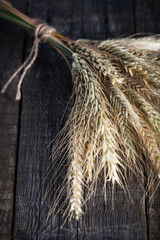 Wheat and barley on wood