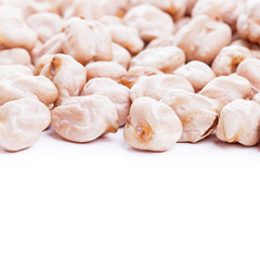 Raw dry chickpeas on white background