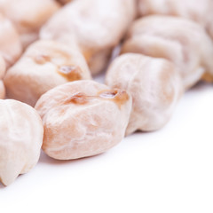 Raw dry chickpeas on white background