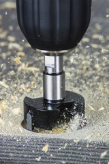 Hinge boring bit drilling a hinge hole