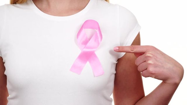Woman wih pink cancer ribbon on chest 4K