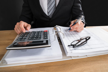 Male Accountant Working With Financial Data