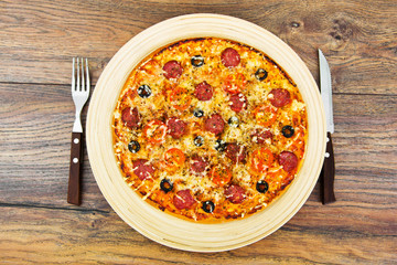 Pepperoni Pizza with Sausage, Cheese, Mozzarella, Olives and Bas