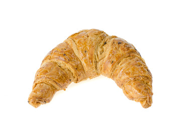 fresh croissant with nuts and raisins on white