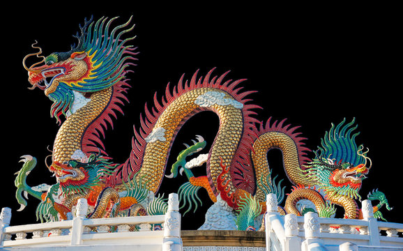 Colorful dragon statue on Black background