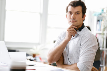 Fototapeta premium Young businessman in office