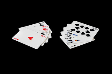 Nine Four cards and ace vs Royal Flush in poker game on black background, (with clipping path)