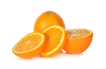whole and sliced ripe orange on white background