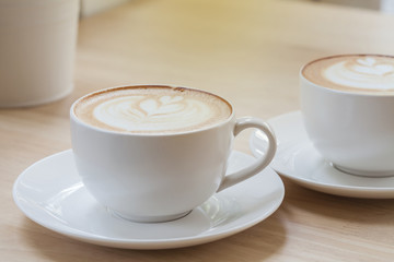 Latte Coffee art on the wooden table