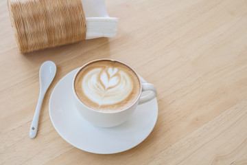 Latte Coffee art on the wooden table