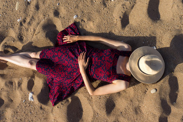 Woman lying on the beach