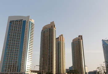 Obraz na płótnie Canvas Dubai city business district with skyscrapers