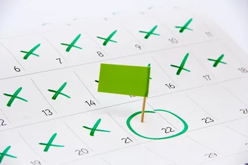 Fotobehang Calendar 2022– Pin the event day or deadline with flag © stock56876
