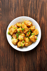 Chicken meat with orange sauce