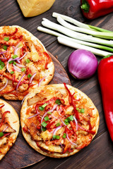 Meat pizza with chicken and vegetables