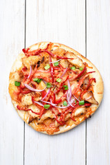 Pizza with chicken meat and vegetables