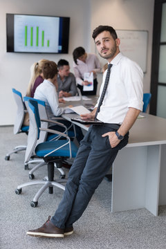 young business man with tablet at office meeting room