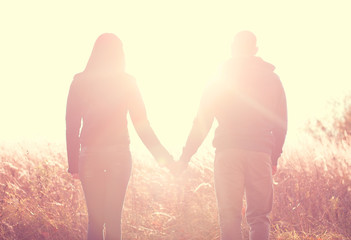 Happy young couple playing park resting summer and spring, fresh air enjoy the emotional Dourges each other's hands