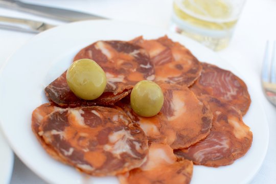 Spanish style tapas, chorizo and olives 