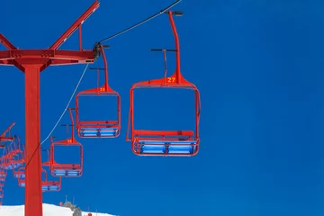 Fotobehang empty red ski lift on the mountain © Daco