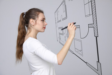 Female architect working with a virtual apartment plan