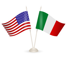 Table stand with flags of Italy and USA. 