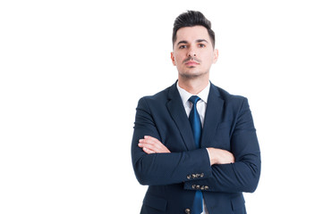 Confident successful and proud businessman with arms crossed