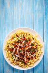 Pasta with meat, tomato sauce and vegetables 