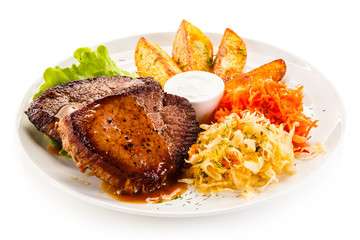 Grilled beefsteaks and vegetables 