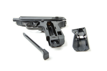 Disassembled gun, isolated