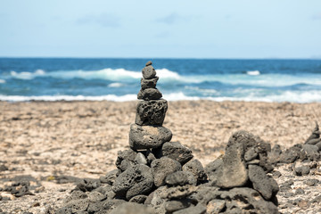 Fototapeta na wymiar Beach near the lighthouse El Toston, northern part of Fuerteventura . Canary Island, spain
