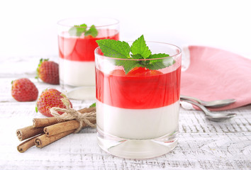 Panna cotta dessert with strawberry jelly 