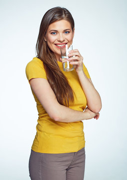 Young woman drink water . Isolated portrait.