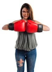 Young girl with boxing gloves